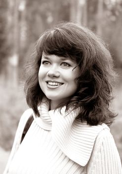 Portrait of a young smiling brunette
