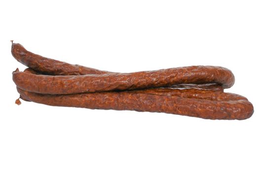 Thin dry-smoked pork sausage isolated on white