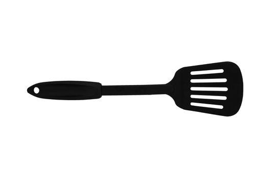 A black spatula you can find in most kitchens.