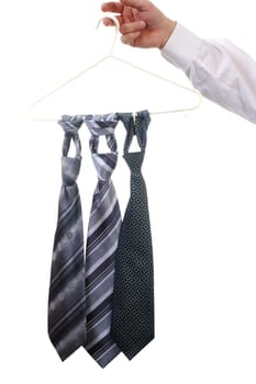 Three tie on hanger isolated on white background