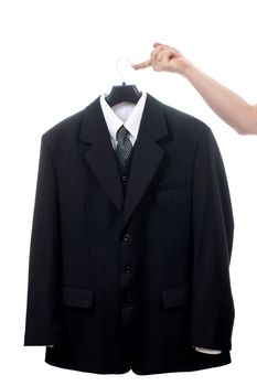 Black suit on hanger isolated on white background