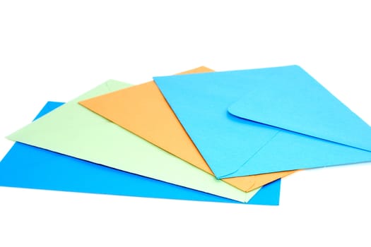 Colorful blank envelopes isolated on white background