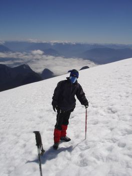 A young man on his way up a volcano in Chile.