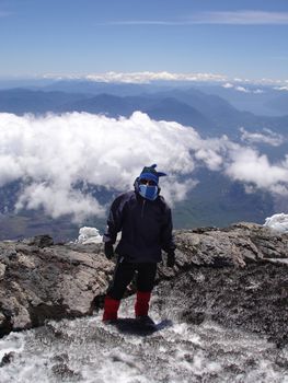 A young man on his way up a volcano in Chile.