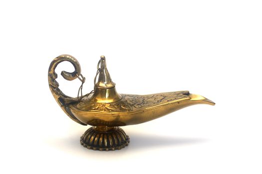 An isolated golden or bronze magic genie lamp, like Aladdins! :)