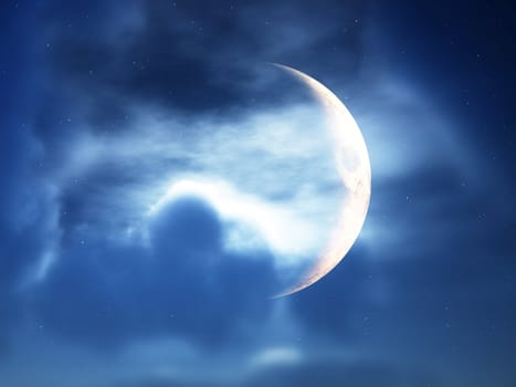 A crescent moon in a cloudy night time sky.