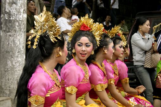 These girls are ready to perform Balinese dance at the opening of Gajah Mada Town Festival in Denpasar, Bali, on December 28, 2008.