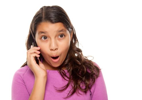 Shocked Pretty Hispanic Girl On Cell Phone Isolated on a White Background.