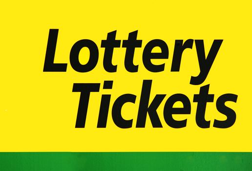 A yellow lottery tickets sign
