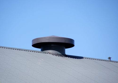 The greater round pipe of ventilation costs on a roof