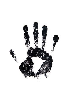 Black hand print on the white surface