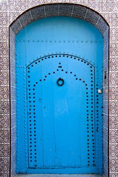 Traditional light blue, vintage, wooden, moorish door.