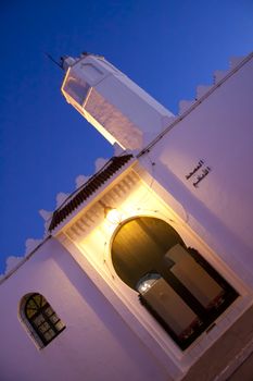 Small local white mosque in Assilah, Morocco