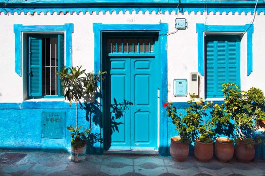 Traditional mediterranean house in a typical light blue colour.