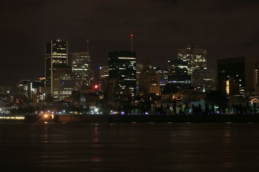 Water edge of Montreal skyline early winter morning