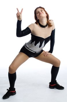 young girl in black and white stage costume on white
