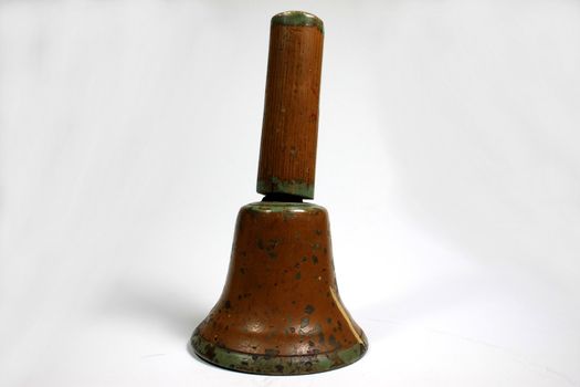 Old school yard bell with woden handle
