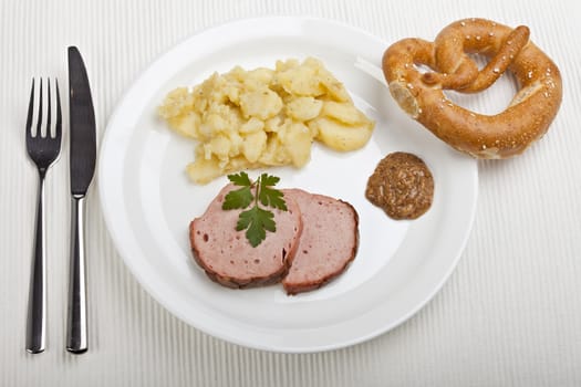 baked bavarian meat loaf on a wooden desk