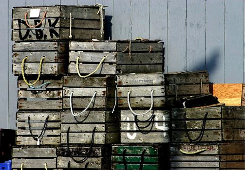 Lobster crates stacked along fishermen's wharf