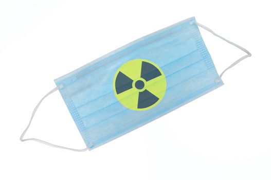 The medical mask isolated for protection from radioactive particles on the white background.
