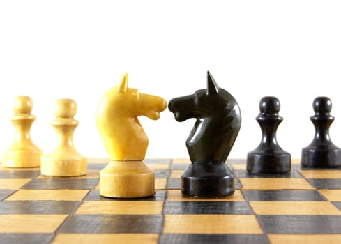 Chess battle on white background