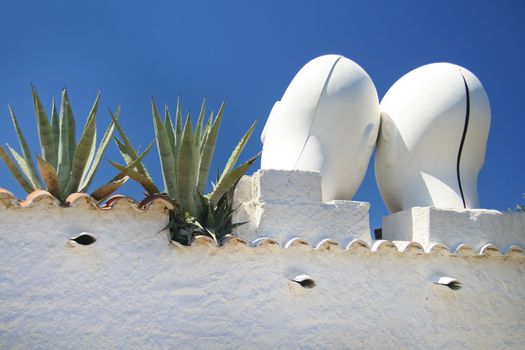 Statue on the wall of the Salvadore Dali's house