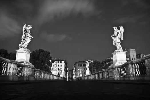 Bernini's Ponte Sant' Angelo shot at night.