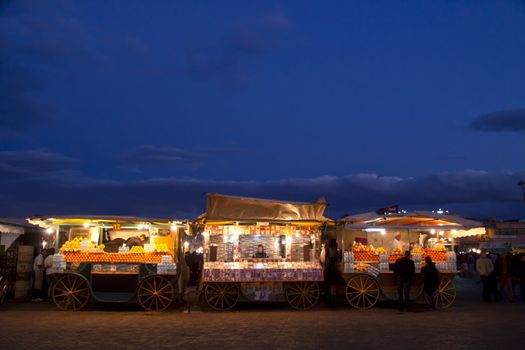 Fruit boots at Jemaa El-Fna shot at dask