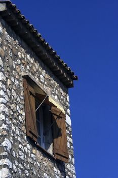 Window with shutters in the medieval castle
