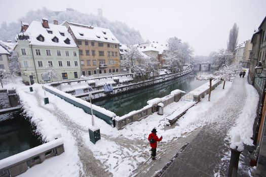 Person ski running in the Ljubljana's historical city centre