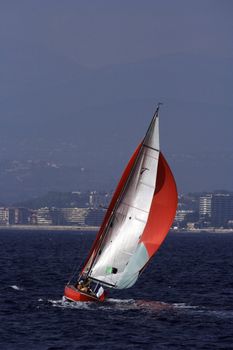 Nice red yacht sailing in the sea