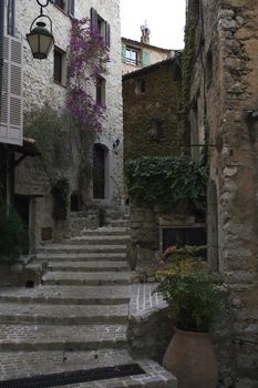 Narrow street of medieval town in France