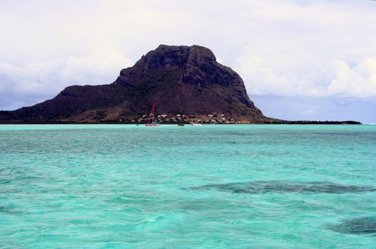 A Turquoise lagoon in Indian ocean near the mountain of Mauritius