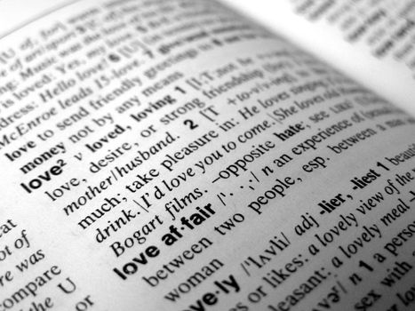 Word love written on a dictionary