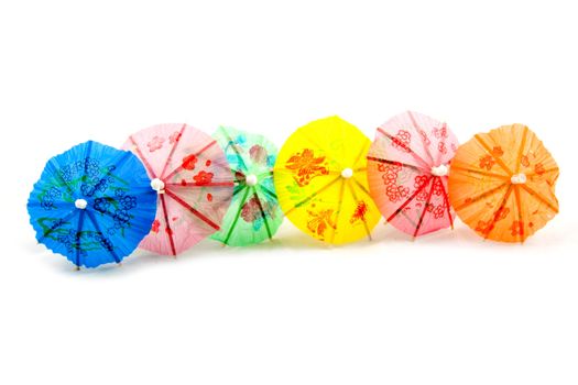 colorful straw parasol isolated on a white background