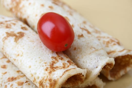 Close up of pancakes on a yellow plate