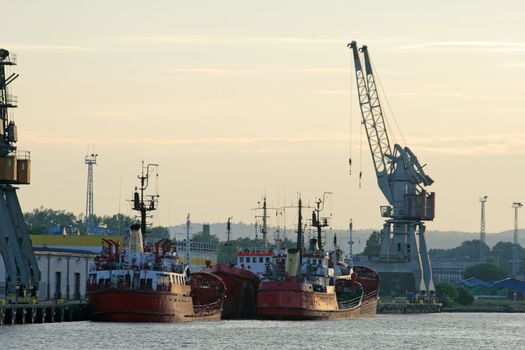 Seaport in Gdansk, Poland with cargo ships moored to the pier
