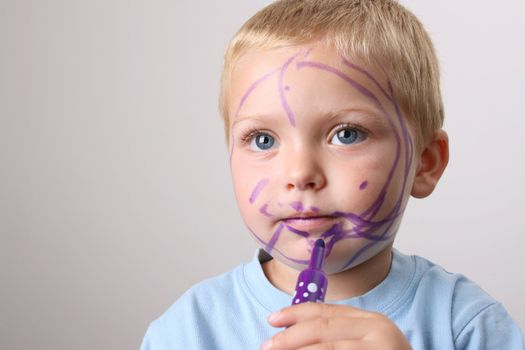 Beuatiful Blond toddler with big blue eyes