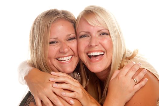 Two Beautiful Sisters Laughing Isolated on a White Background.