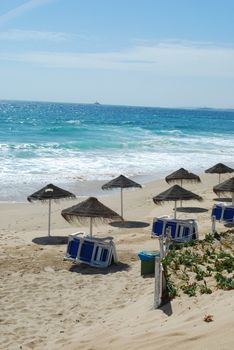 beautiful beach scene with coconuts and relaxing area