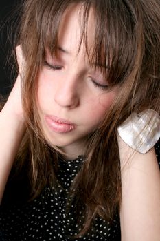 Close up of a teen model with closed eyes