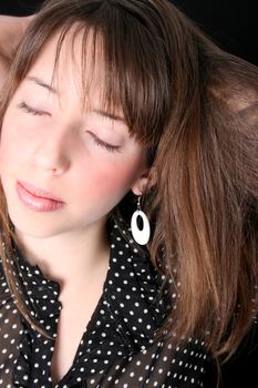 Close up of a teen model with closed eyes