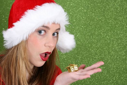 Teenager with red lips wearing a christmas hat