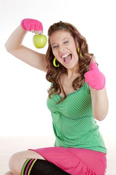 portrait of woman holding an apple