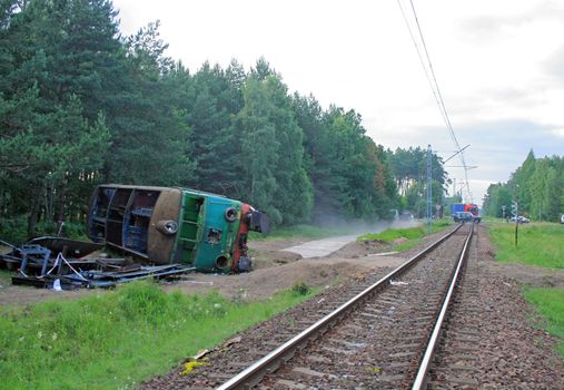 Fatal train crash. Fast train smashed the lorry on the railway crossing, locomotive had derailed.
