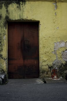 An old door and old grunge wall.