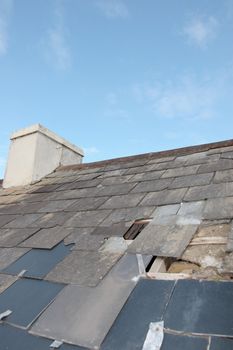 hole in a roof due to storm or decay