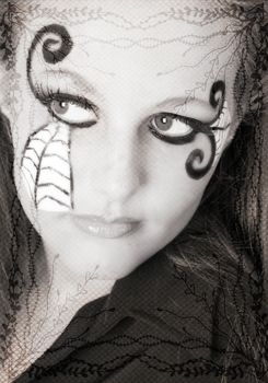 Teenager with Halloween facepaint and bordered layer.  All images property of Photographer