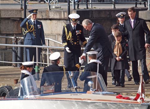 COPENHAGEN - APR 14: Henrik, Prince Consort of Denmark and Prince Joachim after the christening of Prince Vincent and Princess Josephine on April 14, 2011 at Holmens Kirke Copenhagen, Denmark.