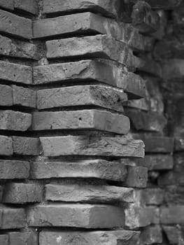 flat piled brick wall in black and white